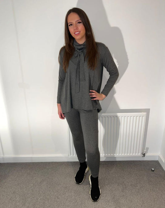 Grey lounge suit with neck tie